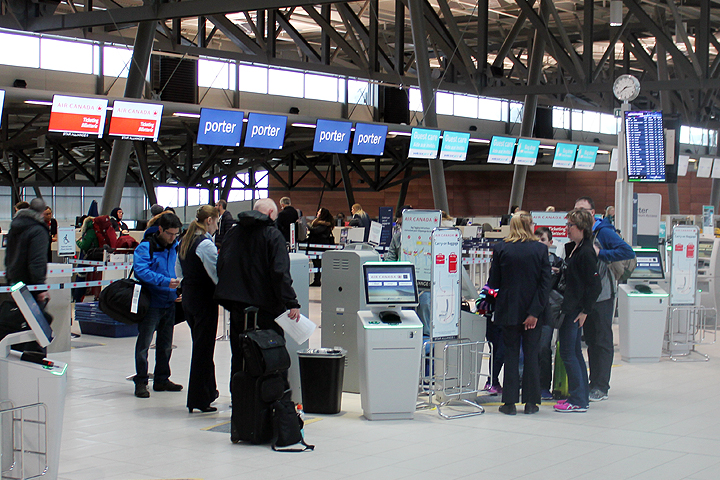 passengers and check in kiosks